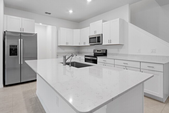 Building Photo - Absolutely stunning 3 BR /2.5 Bath / 2 Car Garage + LOFT townhome in ultra-modern and green-focus...