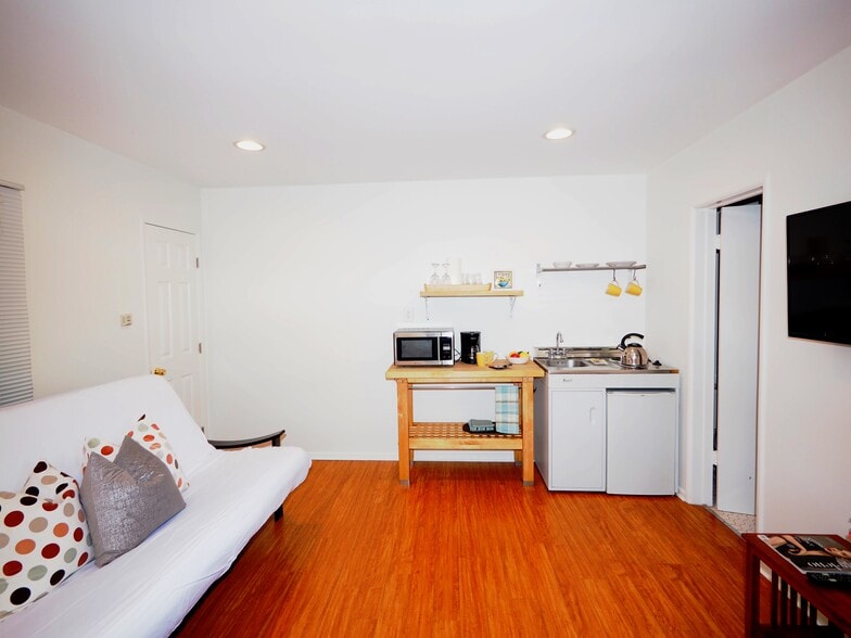 Kitchenette w/2 burner stove, refrigerator, butcher block - 828 7th St