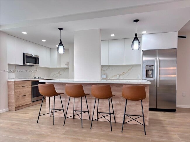 Building Photo - 10230 Collins Ave