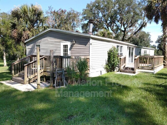 Building Photo - 6455 NW 135th Ave