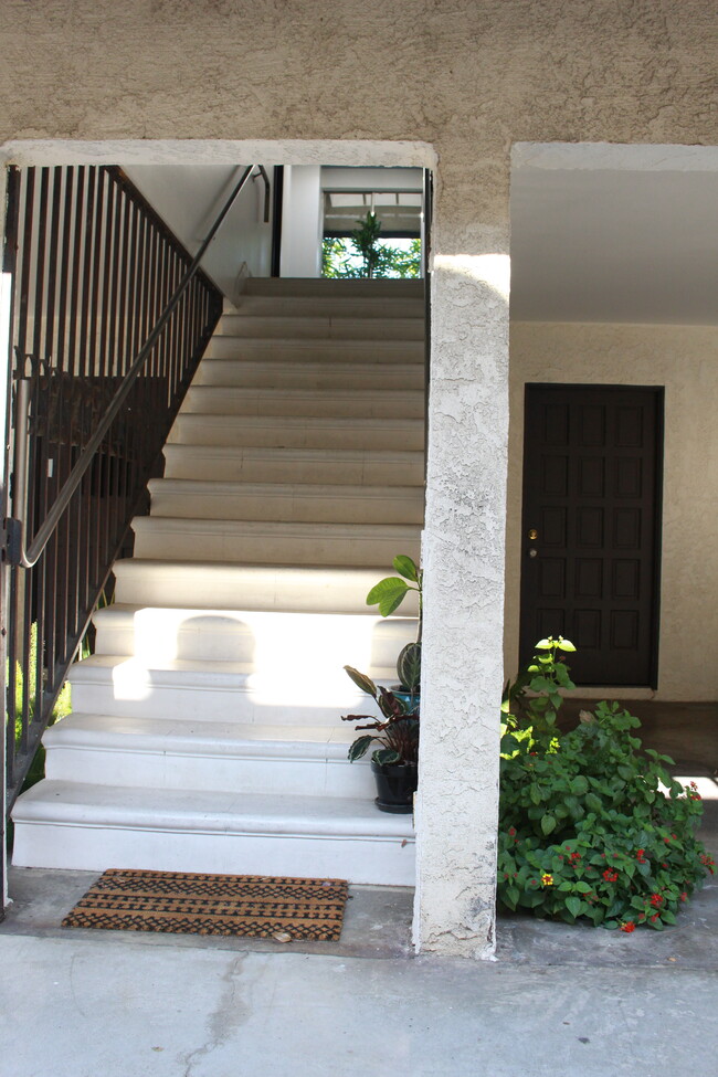 Entry Stairway and detached laundry/storage doorway - 3530 Schaefer St