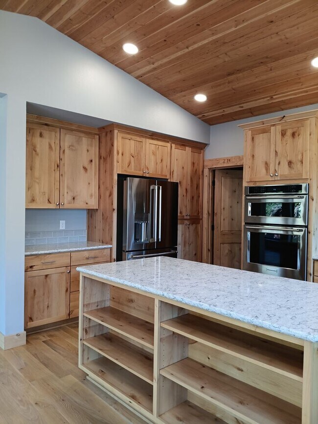 Building Photo - Beautiful Chalet Style Riverfront Property...