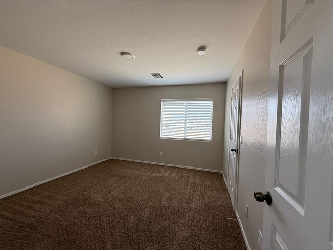 Building Photo - Buckeye, 4 bed, 2.5 bath, huge lot, across...