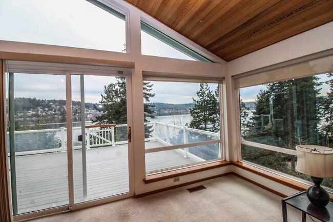 Building Photo - Spacious 4-Bedroom Home with Stunning Lake...