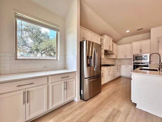Building Photo - Welcome to Caliterra – Hill Country Luxury...