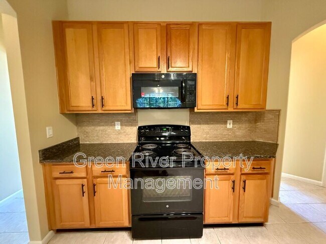 Building Photo - 8716 Canopy Oaks Dr