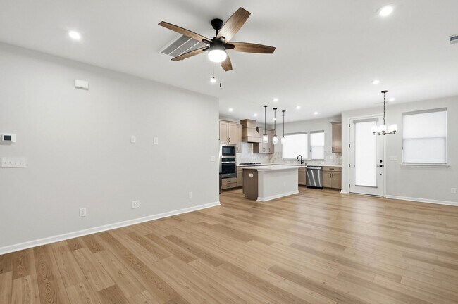 Building Photo - Like-New LoSo Townhome | 3BR + Loft | 2-Car Garage | Move-In Ready