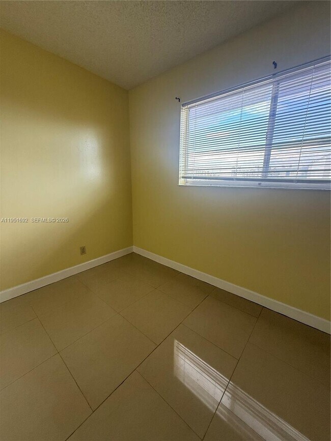 Building Photo - 8740 N Sherman Cir