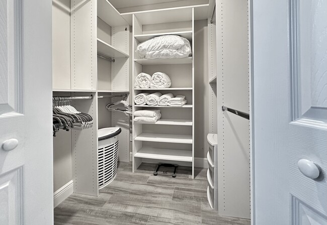 Walk-in Closet - New lines, towels and pillows - 7723 SE Sugar Sand Cir