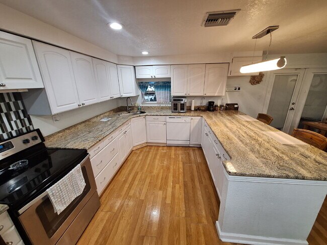 Building Photo - Gulf Access Home on Canal Available Now