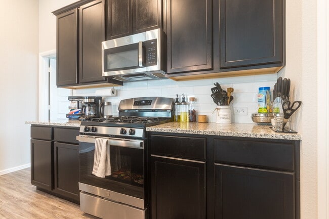 Building Photo - Gorgeous Two Story Home Featuring 2 Living spaces, 5 Bedrooms, and 3.5 Baths