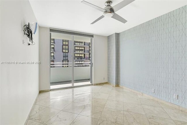 Building Photo - 8911 Collins Ave