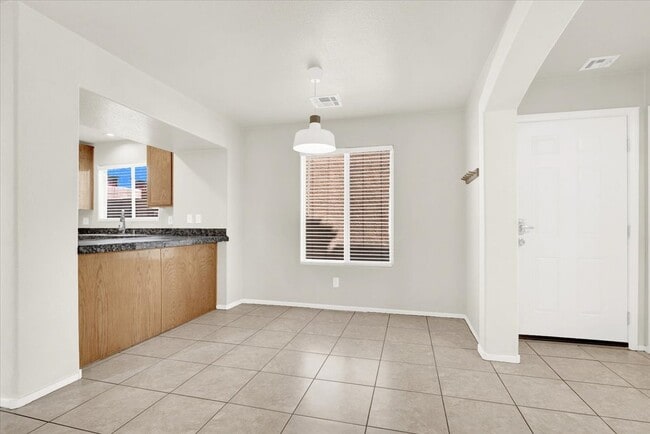 Building Photo - 6909 Graceful Cloud Ave