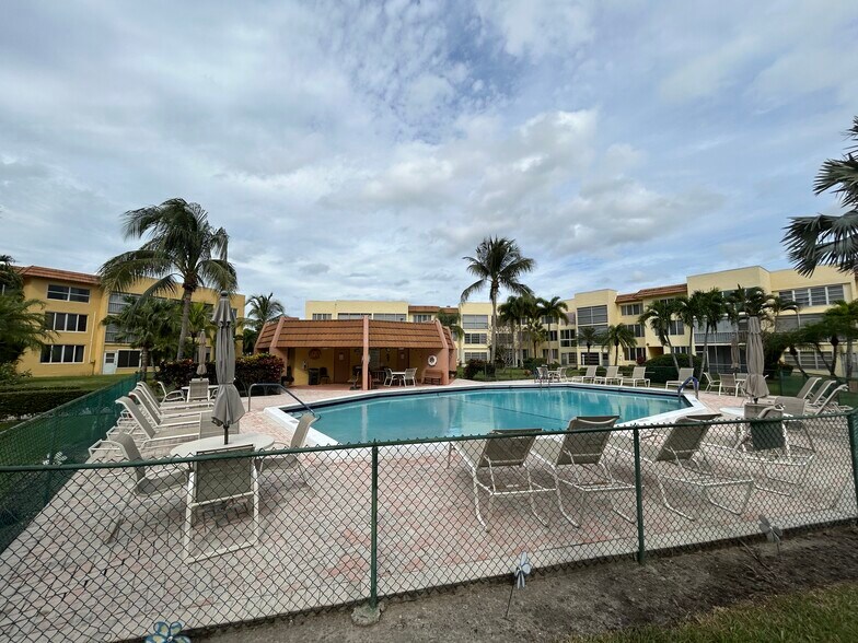 condo pool;there are 3! - 6770 Royal Palm Blvd