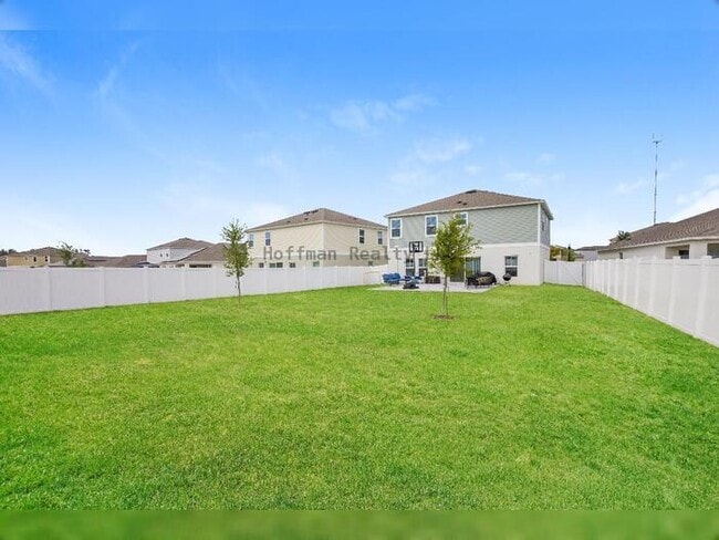 Building Photo - Spacious 5-Bedroom Home in Amenity-Rich Tr...