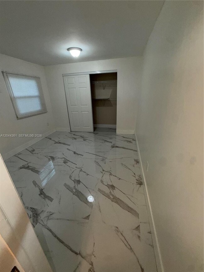 Building Photo - 6497 W 8th Ln