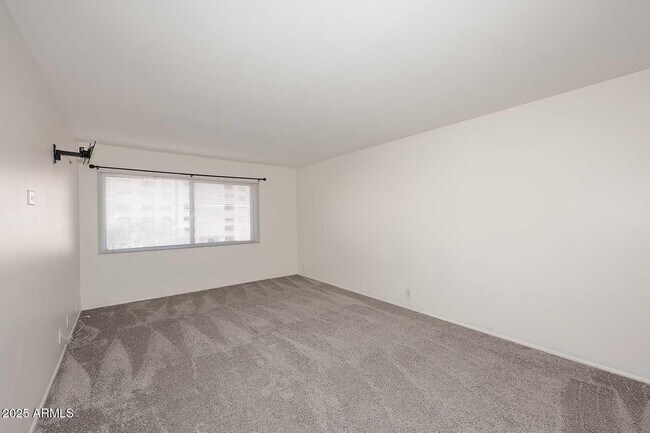 Building Photo - 7910 E Camelback Rd