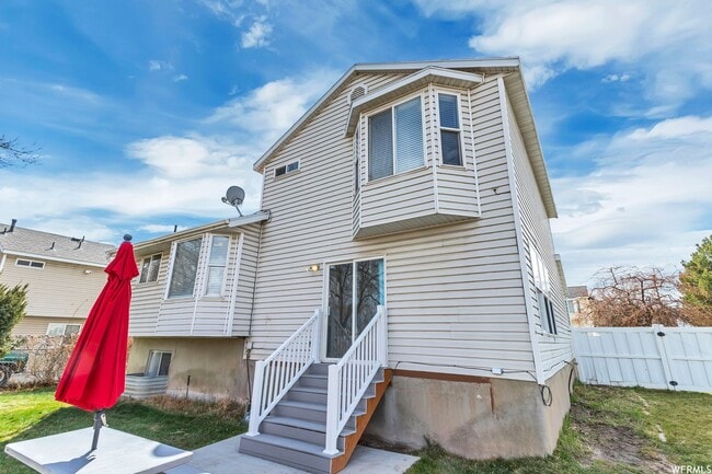 Building Photo - Spacious West Jordan Home Backing to Duck Pond & Trails | Large Yard + Garage