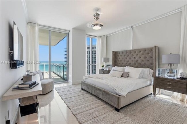 Building Photo - 10295 Collins Ave