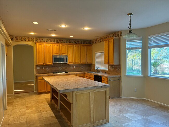 Building Photo - Stunning 4-bedroom hilltop residence nestled in the desirable upper Corona