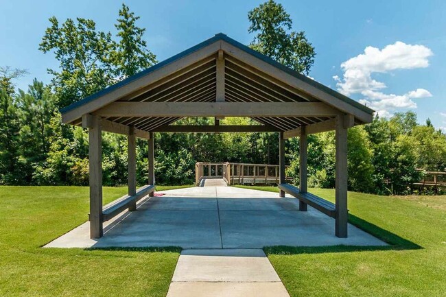 Building Photo - Main Floor Owner's Suite PLUS Main Floor G...