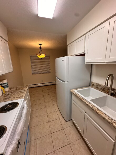 Building Photo - 9277 W 56th Pl