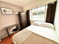 Building Photo - A 3 bedroom, 1 bathroom apartment with a d...