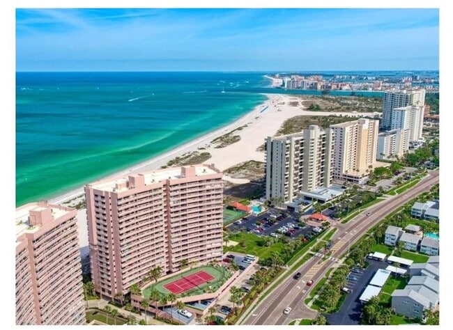 Building Photo - Newly Renovated Beachfront Condo with Stun...