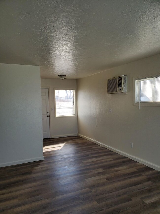 Building Photo - Three bedroom home close to schools and do...