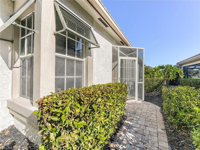 Building Photo - Turnkey 2-bedroom plus den villa, perfectly situated to capture stunning golf course and lake vie...