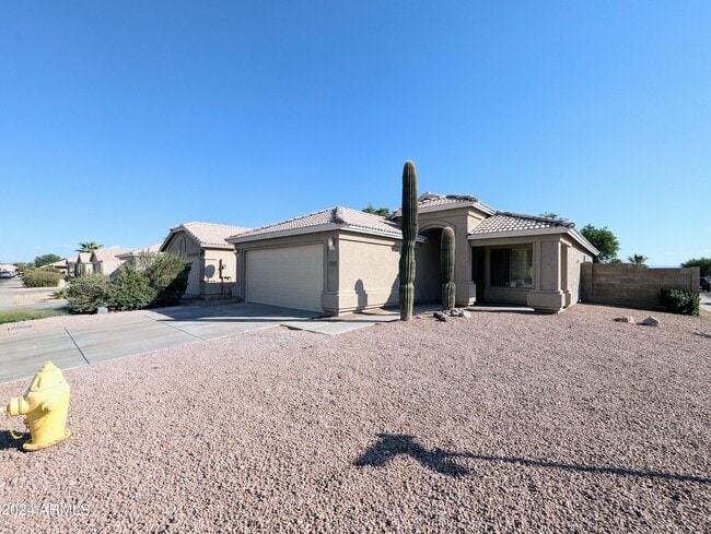 Building Photo - 7059 W Gardenia Ave