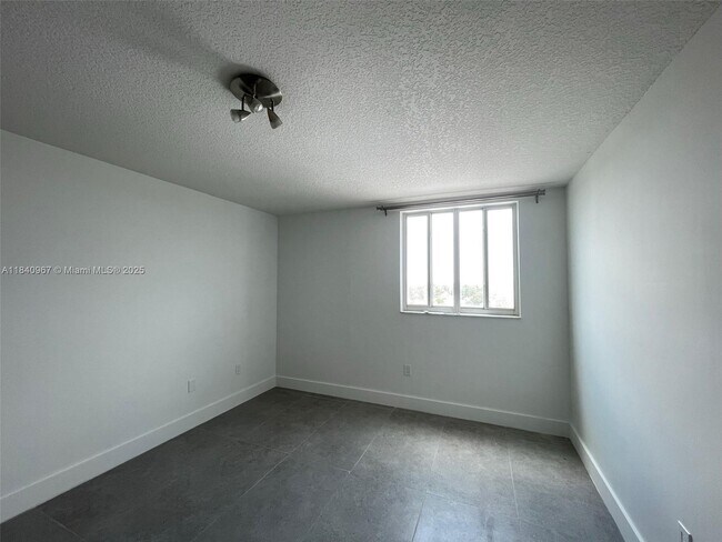 Building Photo - 8888 Collins Ave