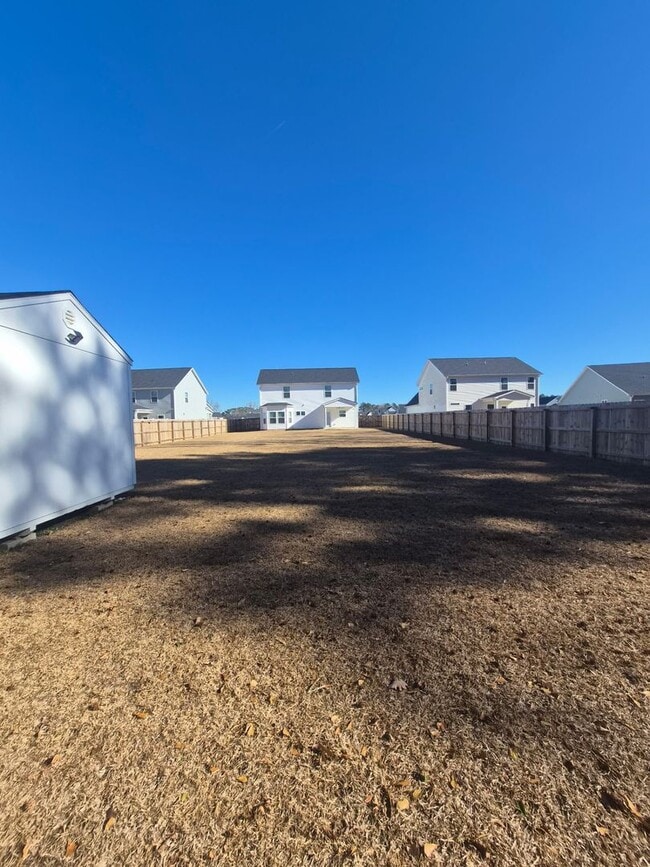 Building Photo - 301 Harvest Mdw Xing