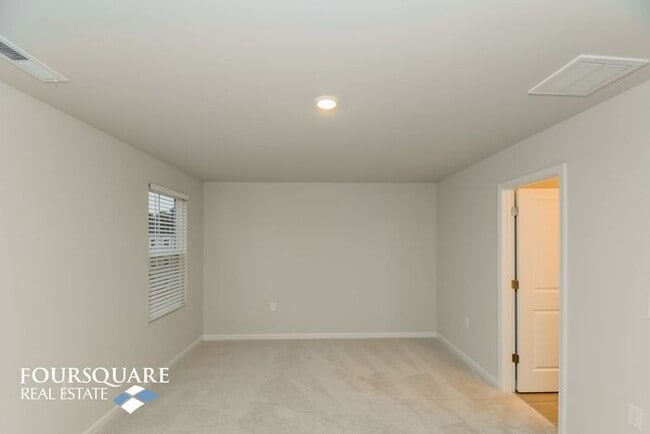Building Photo - Modern 3-Story Townhome with First-Level Bedroom, Open Floor Plan & Community Pool – Prime RTP Lo...