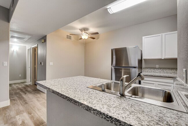 Building Photo - Upgrated upstairs 2 Bedrm 2 bath Gated Com...