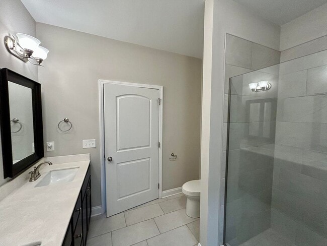 Building Photo - Spacious 3 bed, 3 bath home in Groves Park Commons featuring a modern kitchen, 2-car garage, and ...