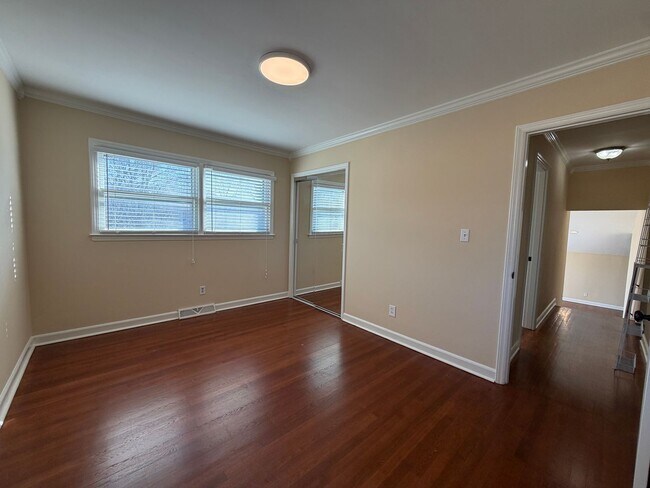 Building Photo - Freshly Painted Split-Level Home with Large Deck & Lawn Care Included