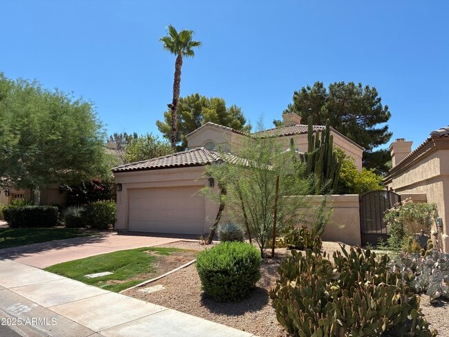 Building Photo - 7891 E Desert Cove Ave