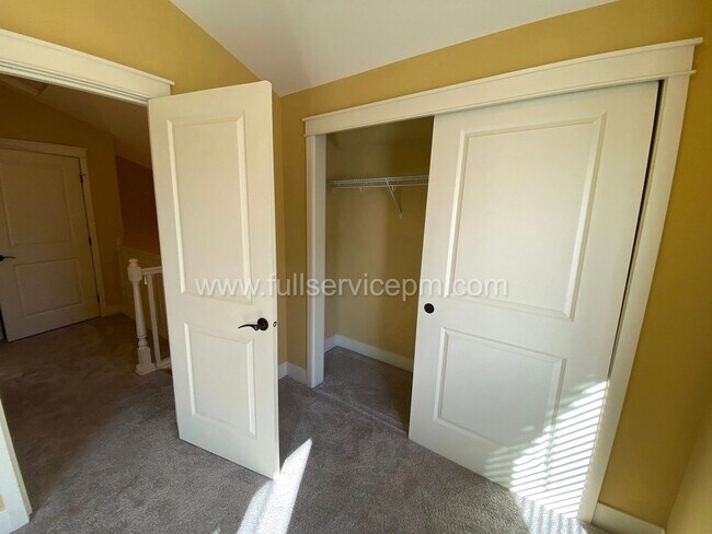 Building Photo - Spacious townhome with private backyard, garage parking, multiple decks, and a dedicated home off...