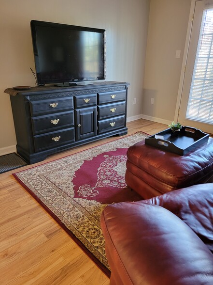 Living Room with french doors to patio. - 435 Haltiwanger Rd