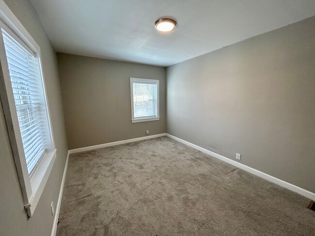 Building Photo - DELHI TWP- Spacious 4 bedroom 3 bath Cape Cod with garage