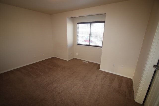 Building Photo - 3 Bedroom Condo close to JBER w/ Fenced Backyard!