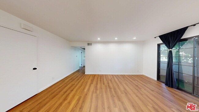Building Photo - 10220 De Soto Ave