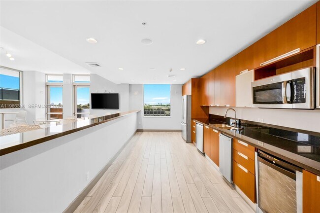 Building Photo - 7901 Hispanola Ave