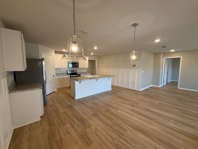 Building Photo - Updated 4 Bedroom 2 Bath Rental Near Navy Federal - Lawn Care Included!