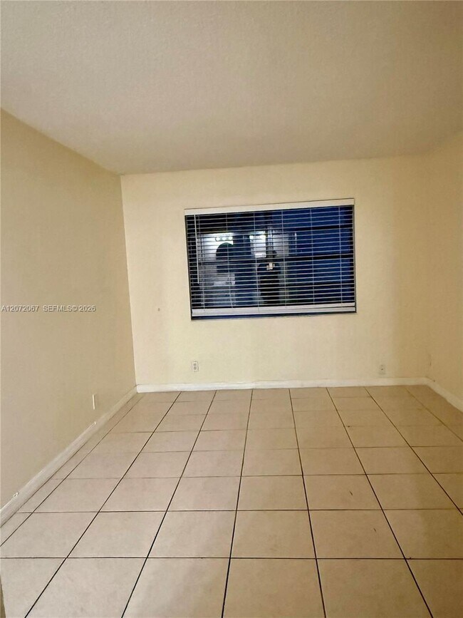 Building Photo - 11225 Royal Palm Blvd