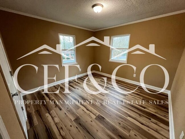 Building Photo - Beautiful 4 bedroom brick ranch now available!