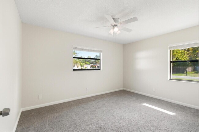 Building Photo - "Charming 3-Bedroom Oasis with 2 Baths on ...