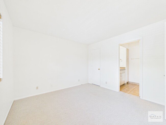 Building Photo - Two Bedroom Second Level Condo Available Now!