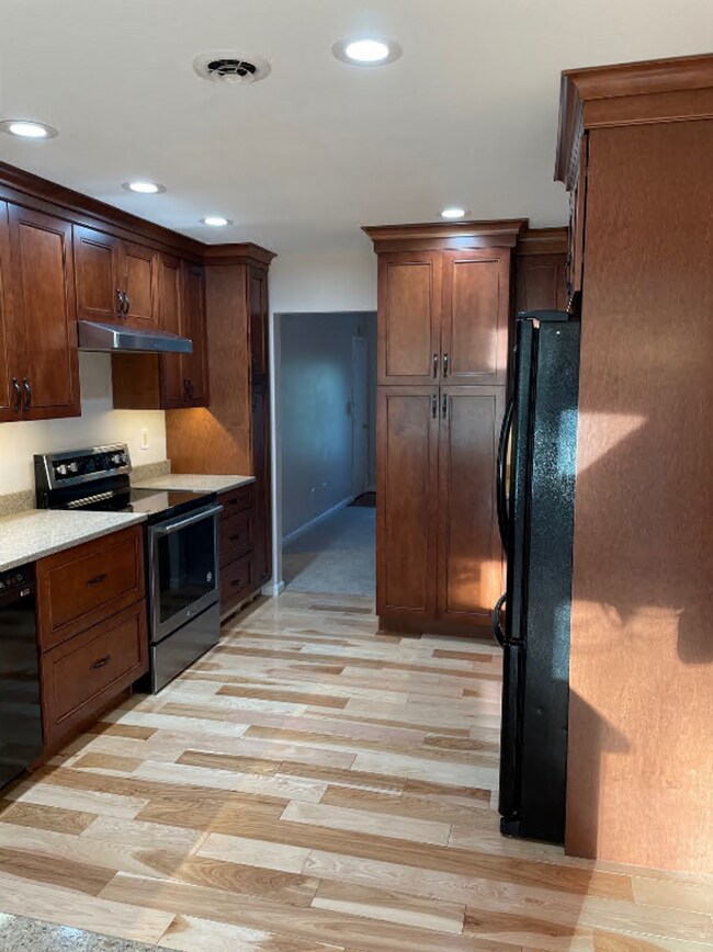 Building Photo - Spacious 5-Bedroom Home with Finished Base...